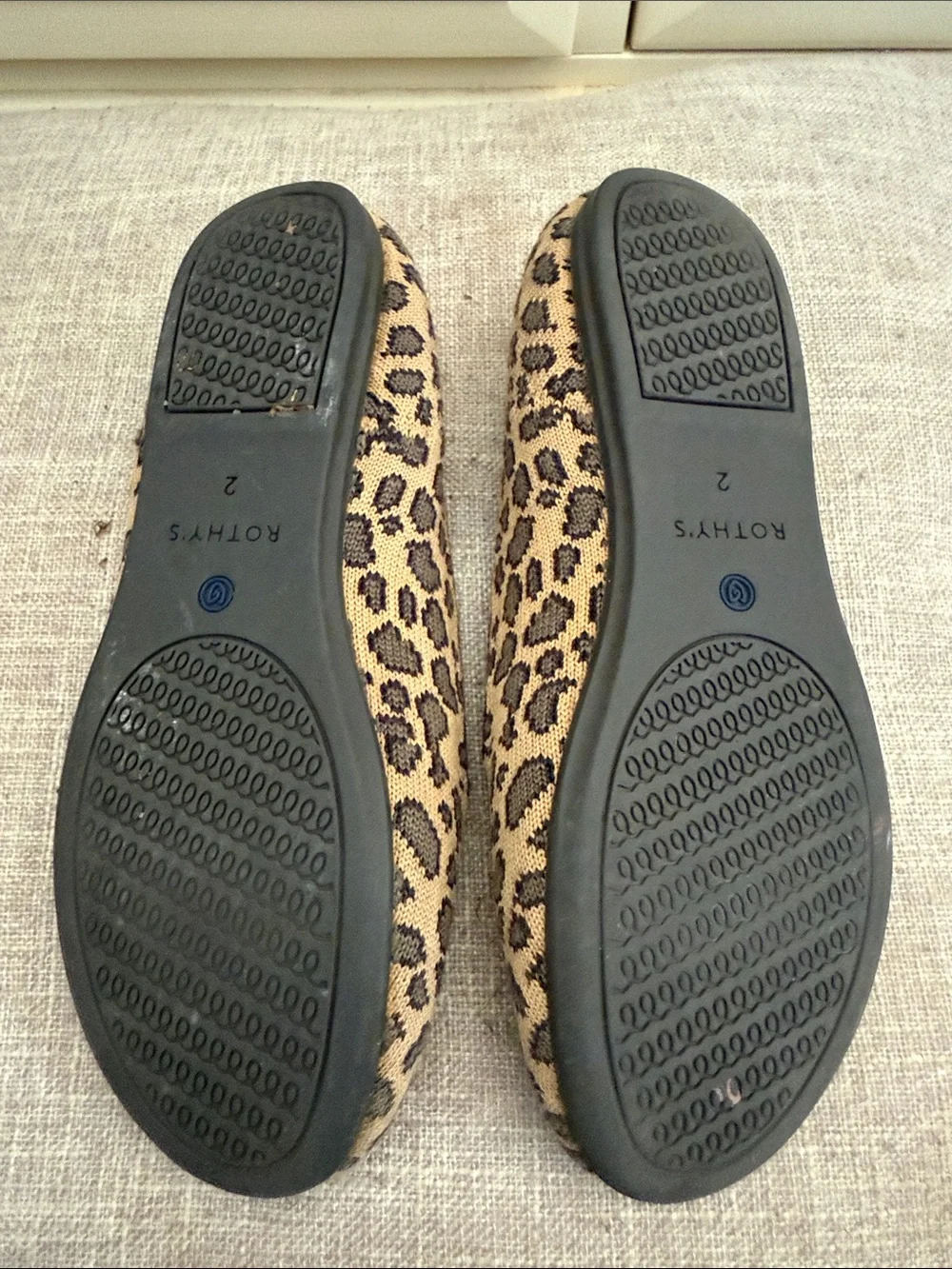 Rothy's Kids Leopard Print Slip-Ons with Blue Accent